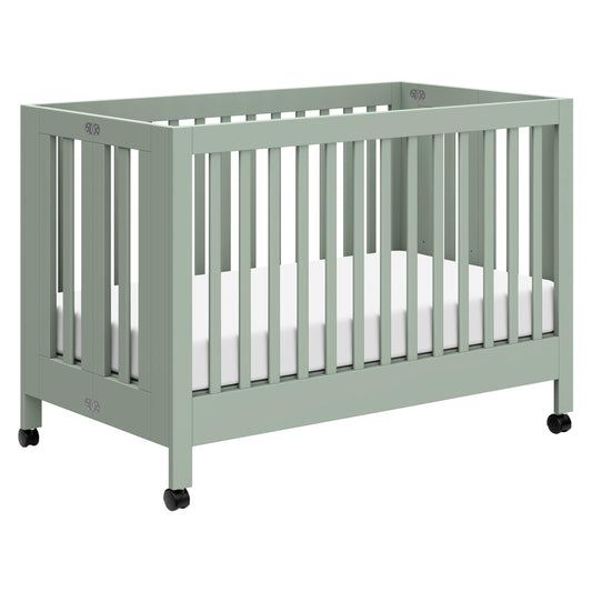 Babyletto Maki Full-Size 2-in-1 Portable Folding Crib with Toddler Bed Conversion Kit in Light Sage, Greenguard Gold Certified