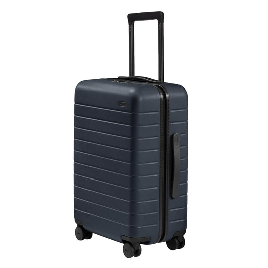 Away Bigger Carry-On Luggage - 23-Inch Lightweight Hardside Suitcase with 360° Spinner Wheels, Interior Compression System, TSA-Approved Lock - Navy Blue