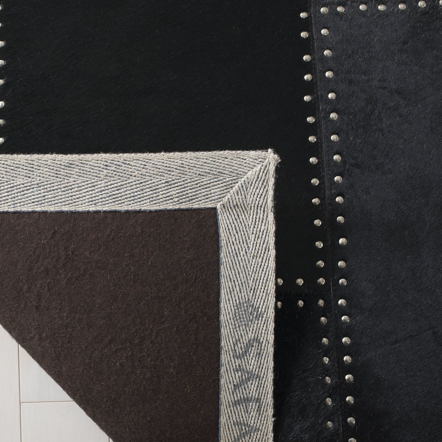 SAFAVIEH Studio Leather Collection Area Rug - 9' x 12', Black, Handmade Mid-Century Modern, Ideal for High Traffic Areas in Living Room, Bedroom (STL174Z)