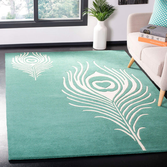 SAFAVIEH Soho Collection 7'6" x 9'6" Teal / Ivory SOH704T Handmade Premium Wool & Viscose Area Rug