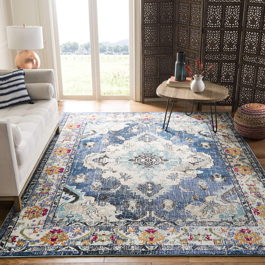 SAFAVIEH Monaco Collection Area Rug - 9' x 12', Navy & Light Blue, Non-Shedding & Easy to Clean, Distressed Medallion Design, Ideal for Living Room, Bedroom, Dining Space (MNC243N)