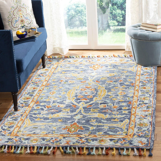 SAFAVIEH Aspen Collection Area Rug - 9' x 12', Blue & Rust, Handmade Boho Braided Tassel Wool, Ideal for High Traffic Areas in Living Room, Bedroom (APN116M)